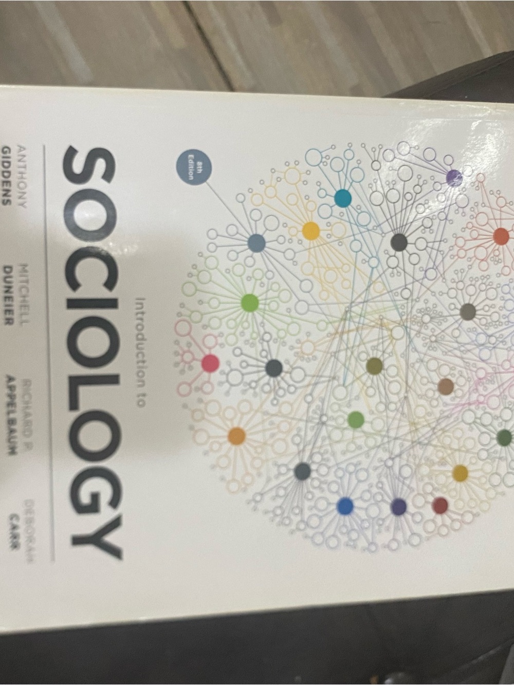 Sociology Textbook - White Cover with Multicolor Network Graphic